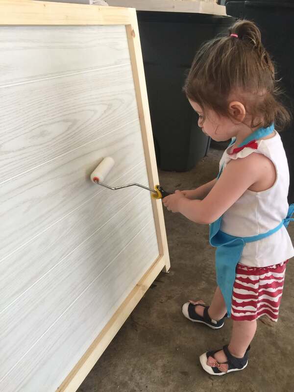 Little Girl Painting Assistant
